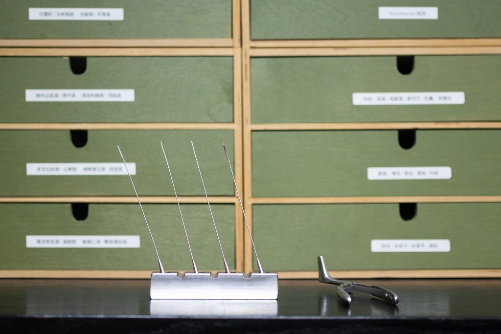 Chinese herbal medicine cabinet with acupuncture needles